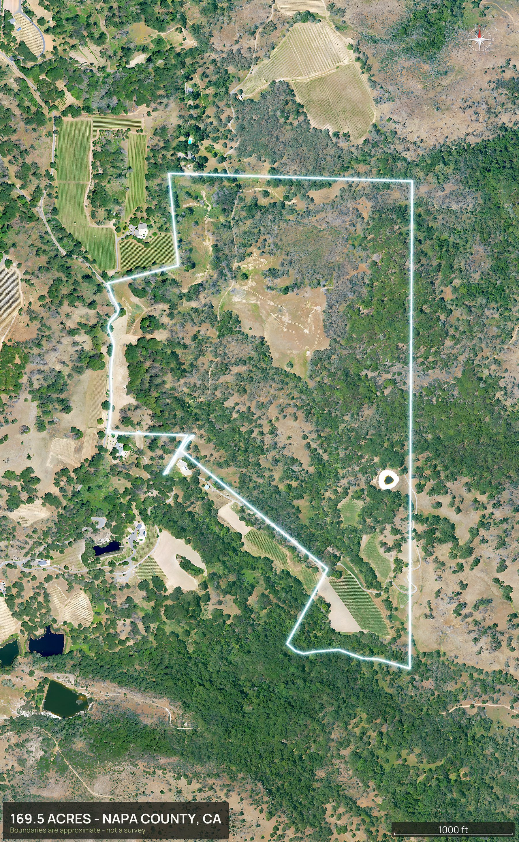 Outlined top down aerial photo of a California land parcel with the boundary drawn in green