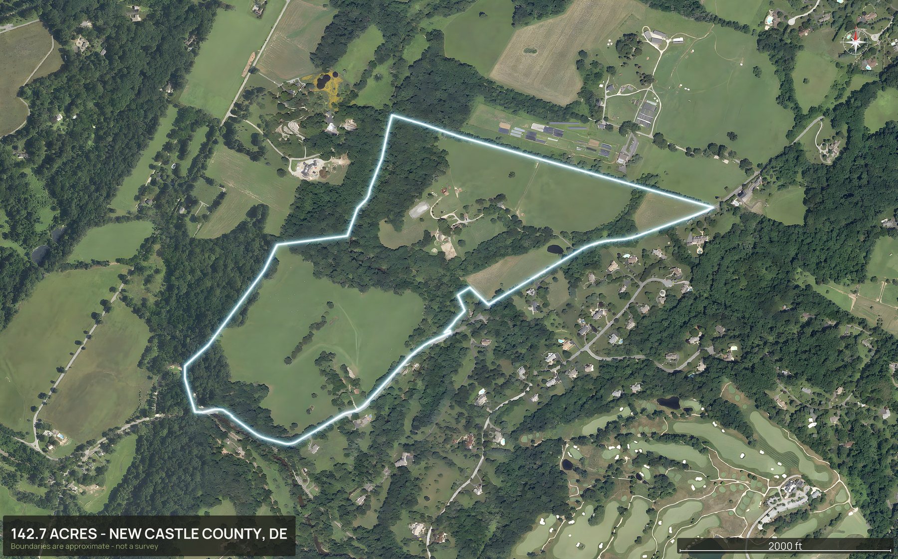 Outlined top down aerial photo of a Delaware land parcel with the boundary drawn in green
