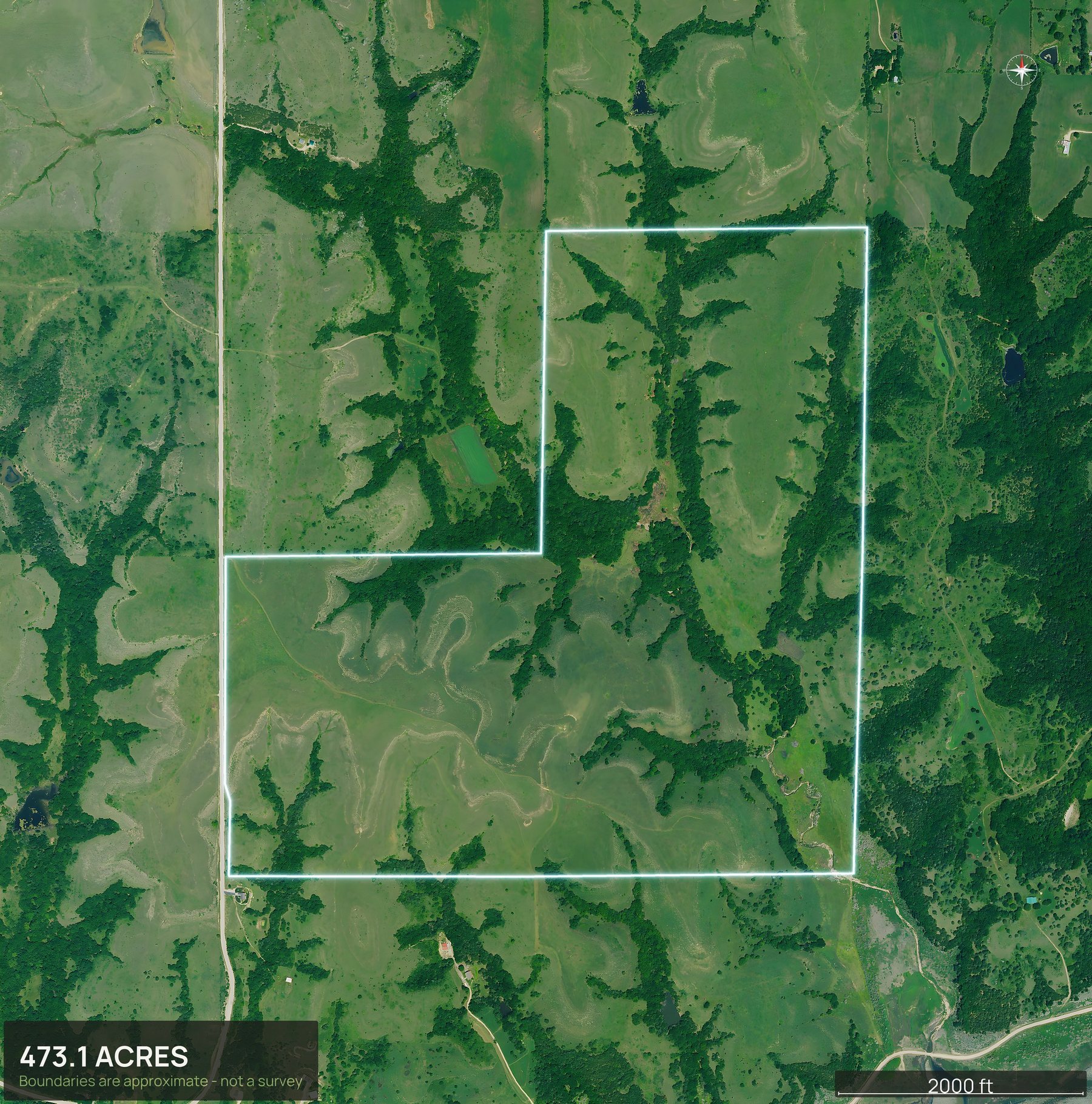 Outlined top down aerial photo of a Kansas land parcel with the boundary drawn in green