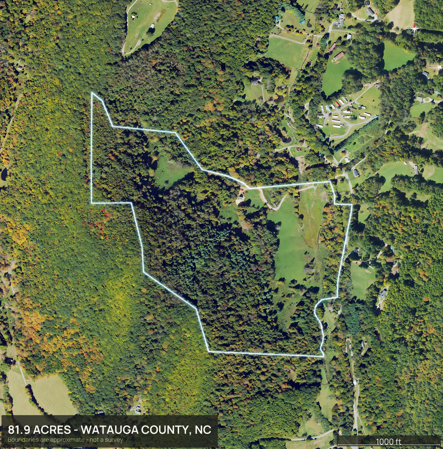 Outlined top down aerial photo of a North Carolina land parcel with the boundary drawn in green