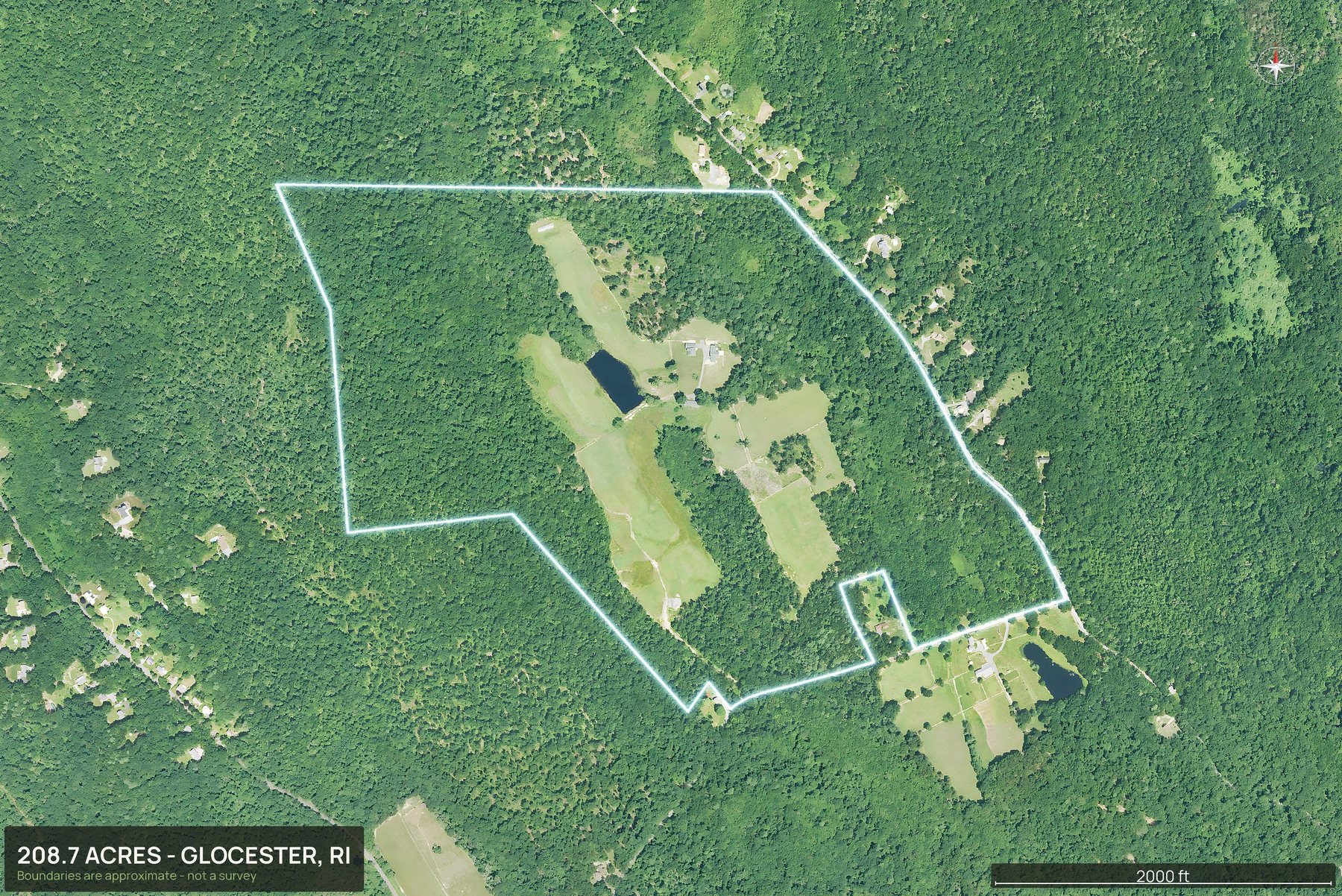 Outlined top down aerial photo of a Rhode Island land parcel with the boundary drawn in green