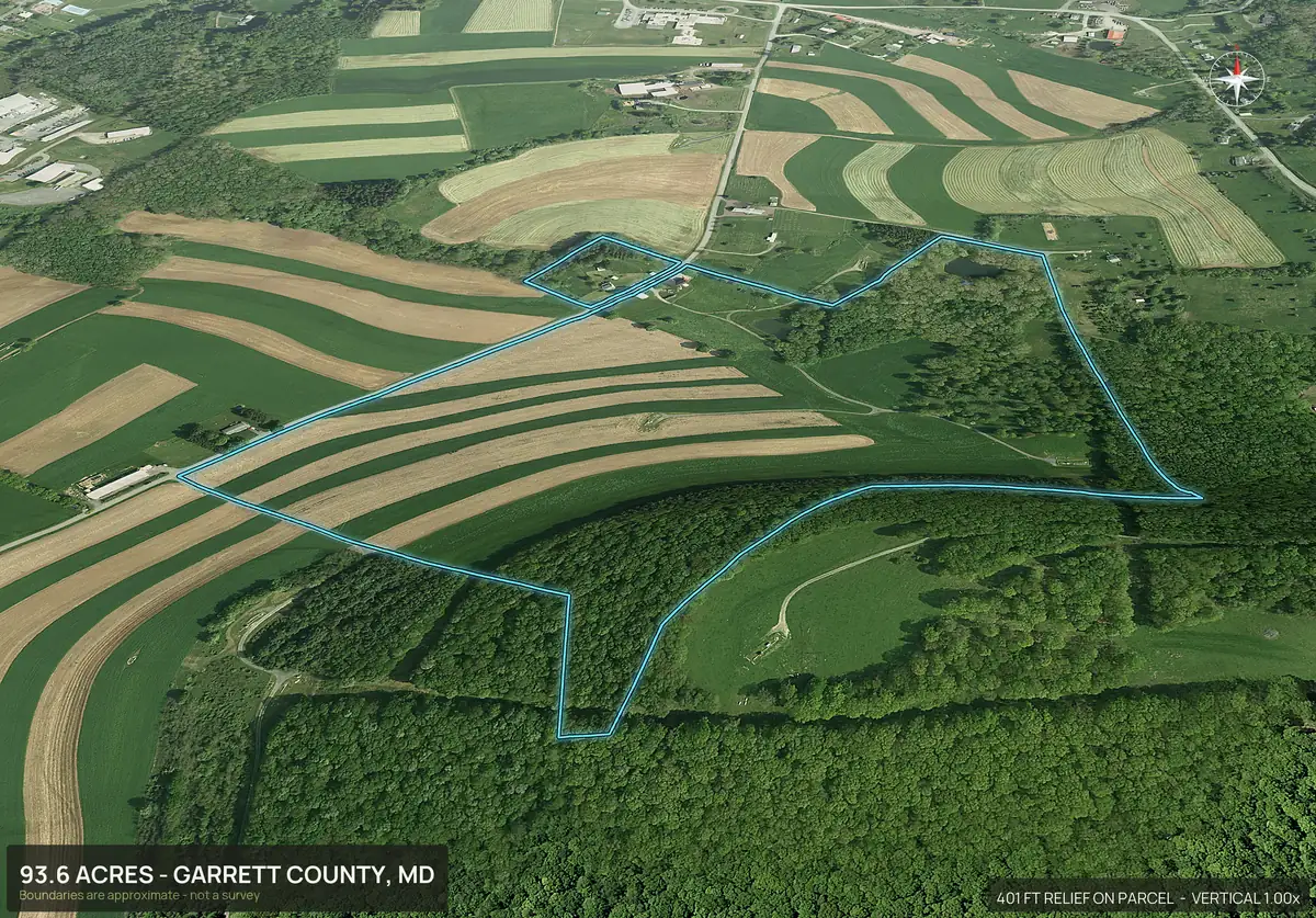 Aerial 3D view of a Maryland farm parcel with contour strip cropping on hillsides, woods and a farmstead, boundary outlined