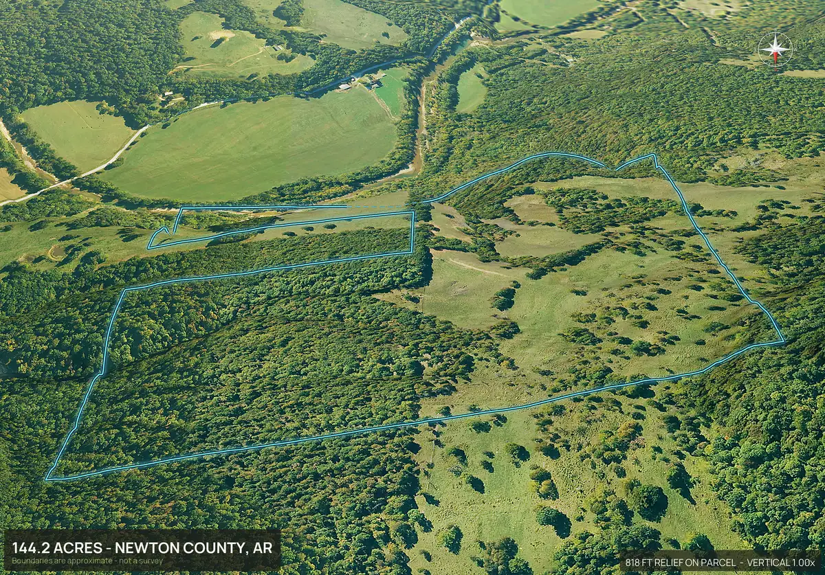 Aerial 3D view of a wooded Ozark parcel in Arkansas with hardwood ridges, small pastures and openings, boundary outlined