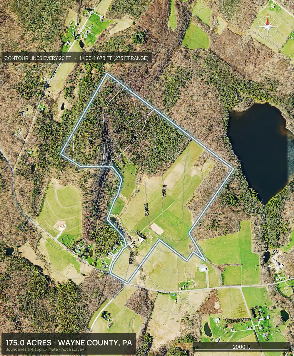 Contour map of a Pennsylvania parcel with the boundary outlined, a pond to the east and a wooded ravine