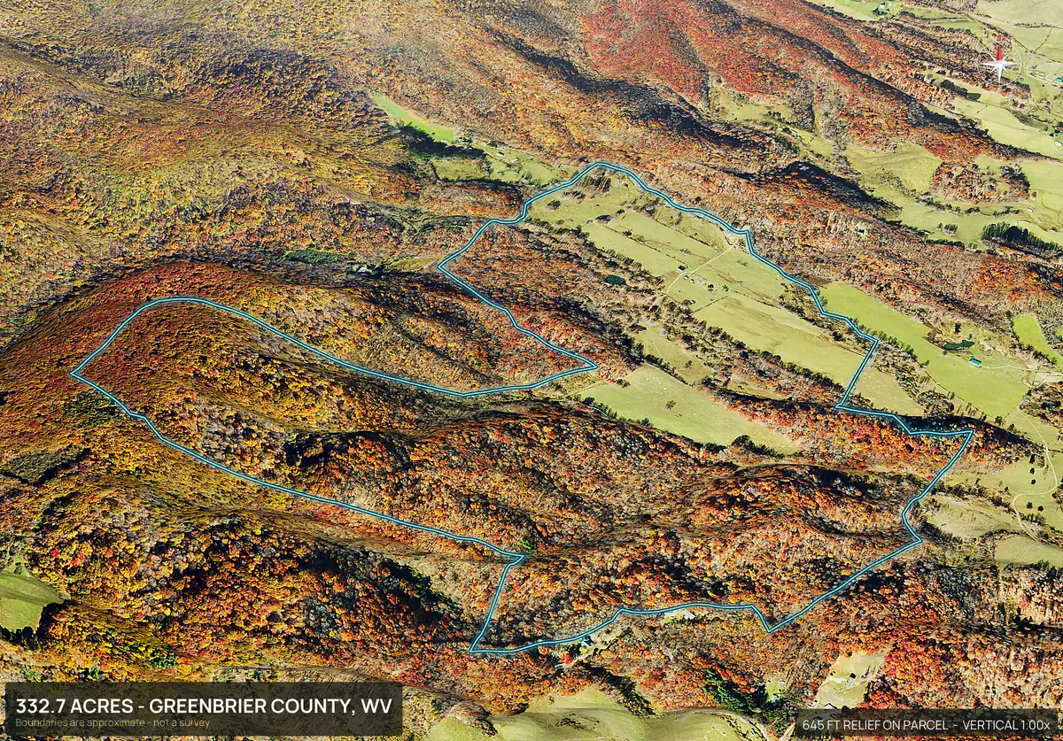 Aerial 3D view of a wooded Appalachian ridge parcel in West Virginia in fall color with hayfields along the bottom