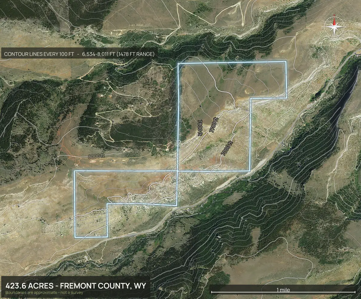 Contour map of a Wyoming ridge and canyon ranch parcel with the boundary outlined and contours every 100 feet